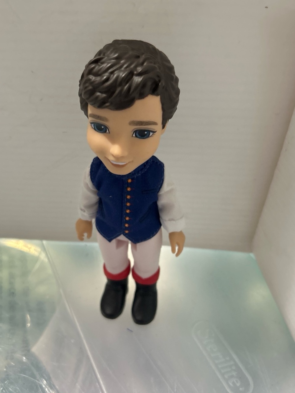 Disney Boy Fashion Doll with Blue Vest, White Shirt, Black Boots and Red Cuffs